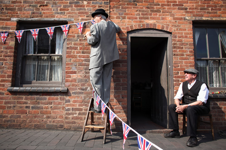Visitor guides begin preparing the streets of the Black Country Living Museum for it's Royal Wedding Street party on April 22, 2011 in Dudley, England. (Photo by Christopher Furlong/Getty)