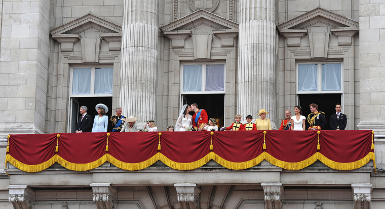 The Newlyweds Greet Wellwishers From The Buckingham Palace Balcony (Photo by John Stillwell/WPA Pool/Getty)