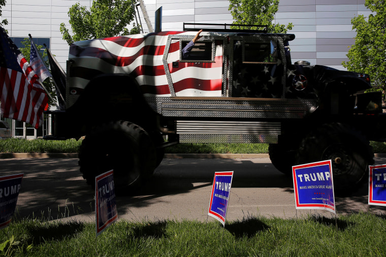 A vehicle carrying supporters of Republican presidential candidate Donald Trump circles the Old National Events Plaza in Evansville, Ind., April 28, 2016. (Photo by Aaron P. Bernstein/Reuters/ZUMA)