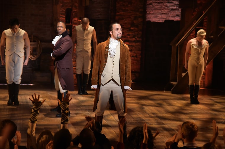 Actor Leslie Odom Jr., actor-composer Lin-Manuel Miranda (R) and cast of \"Hamilton\" perform on stage during \"Hamilton\" GRAMMY performance for The 58th GRAMMY Awards at Richard Rodgers Theater, Feb. 15, 2016. (Photo by Theo Wargo/WireImage/Getty)