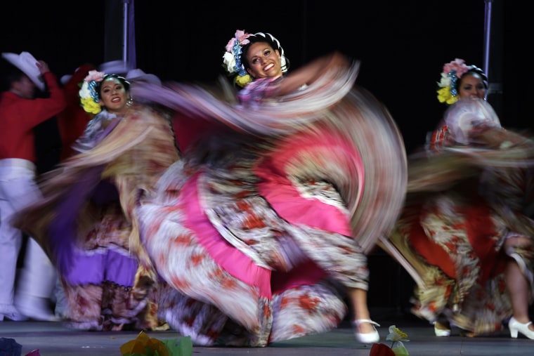 Dancers perform during Cinco de Mayo celebrations in Portland, Ore., May 5, 2015. (Photo by Don Ryan/AP)
