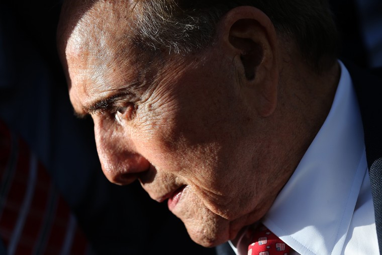 World War II veteran and former Sen. Bob Dole attends a Veterans Day ceremony at the National World War II Memorial on Nov. 11, 2015 in Washington, DC. (Photo by Win McNamee/Getty)