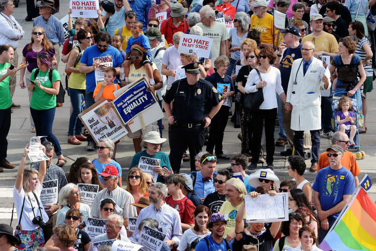 Protesters head into the Legislative building for a sit-in against House Bill 2 in Raleigh, N.C., April 25, 2016. (Photo by Chuck Liddy/The News & Observer/AP)