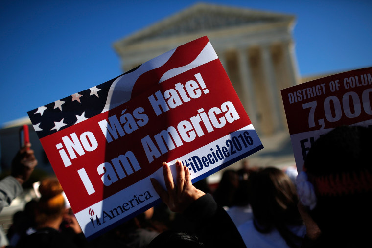 Supporters of immigration reform protest outside the U.S. Supreme Court on Nov. 20, 2015 in Washington, DC. (Photo by Win McNamee/Getty)