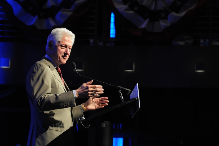 Former President Bill Clinton campaigns for his wife, Democratic presidential candidate Hillary Clinton on May 20, 2016, in Sioux Falls, S.D. (Photo by James Nord/AP)
