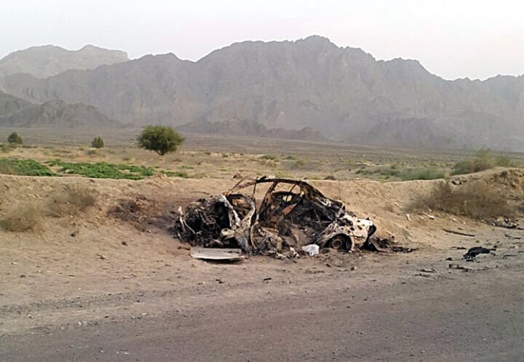 This photo taken by a freelance photographer on May 22, 2016, purports to show the destroyed vehicle in which Mullah Mohammad Akhtar Mansour was traveling in Baluchistan province of Pakistan, near Afghanistan's border. (Photo by Abdul Salam Khan/AP)