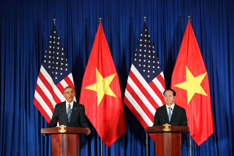 Vietnam's President Tran Dai Quang (R) and President Barack Obama (L) take part in a joint press conference at the International Convention Center in Hanoi on May 23, 2016. (Photo by Luong Thai Linh/AFP/Getty)