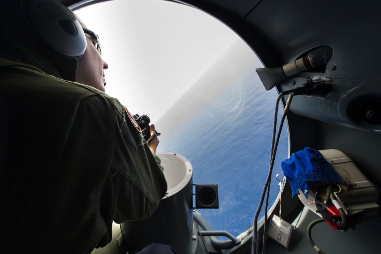 A French soldier searches for debris from the crashed EgyptAir flight MS804 over the Mediterranean Sea, May 20, 2016. (Photo by Alexandre Groyer/Marine Nationale/AFP/Getty)
