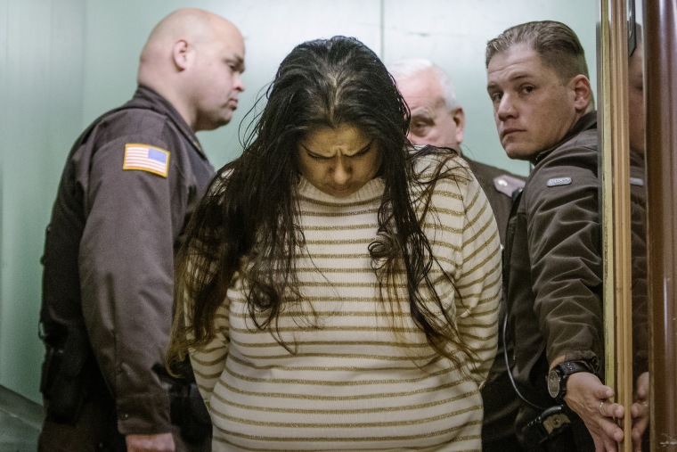 Purvi Patel is taken into custody after being sentenced to 20 years in prison for feticide and neglect of a dependent, at the St. Joseph County Courthouse in South Bend, Ind., March 30, 2015. (Photo by Robert Franklin/South Bend Tribune/AP)