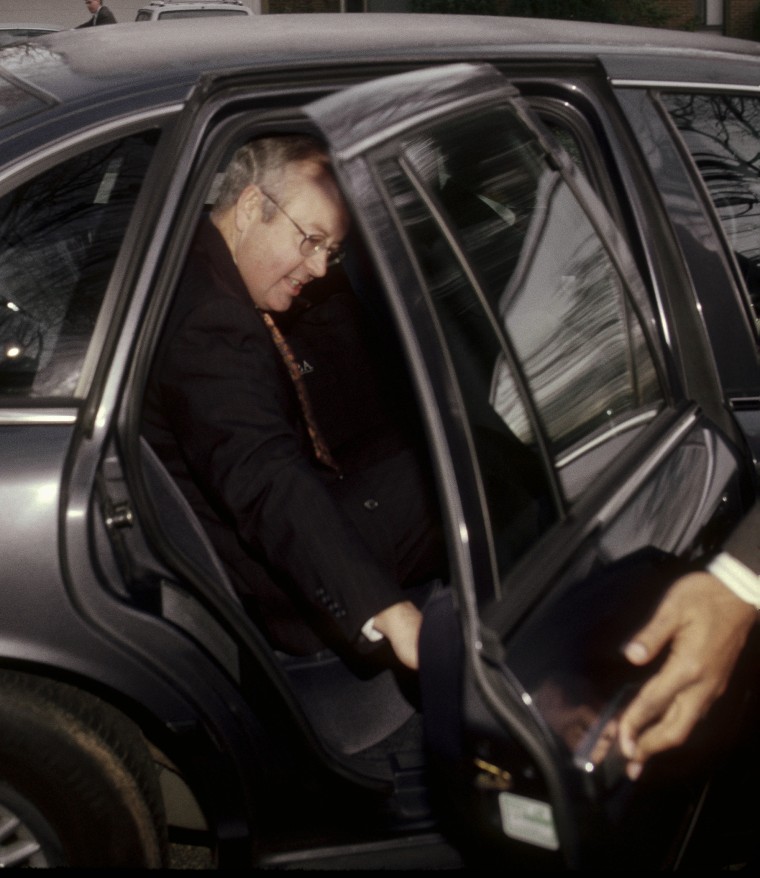 Judge Kenneth Starr leaves his home in McLean, Va., on his way into Washington to continue work as the independent counsel investigate the suicide death of Vince Foster, Feb. 9, 1998. (Photo by Mark Reinstein/ZUMA)