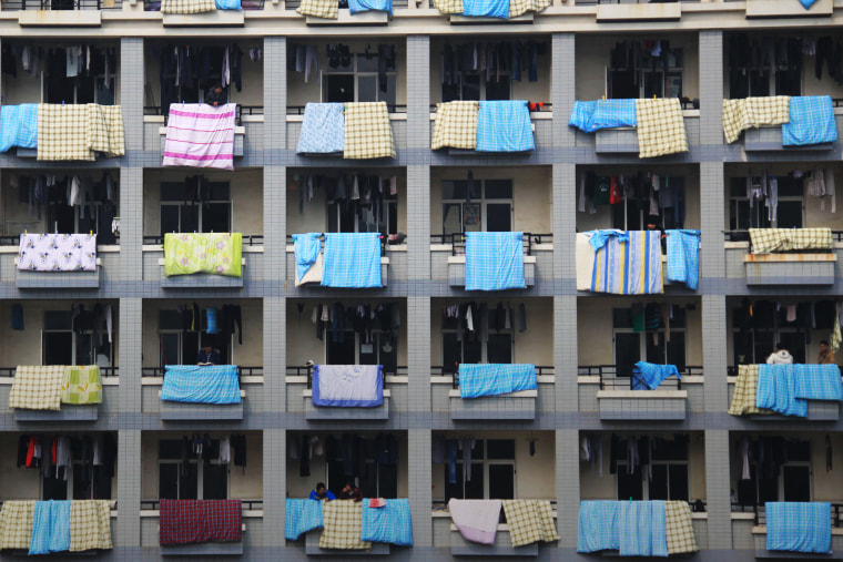 Laundry hangs from balconies on March 6, 2012 in Zhenjiang, China. (Photo by ChinaFotoPress/ZUMA)