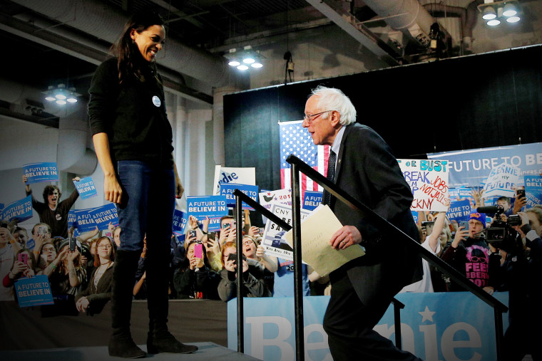 Actress Rosario Dawson welcomes U.S. Democratic presidential candidate and Senator Bernie Sanders to the stage at a campaign rally in Syracuse, N.Y., April 12, 2016. (Photo by Brian Snyder/Reuters)