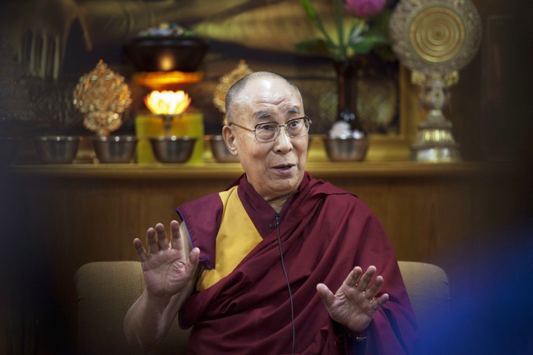 Tibetan spiritual leader the Dalai Lama gestures as he speaks to a group of youth leaders in Dharmsala, India on May 3, 2016. (Photo by Ashwini Bhatia/AP)