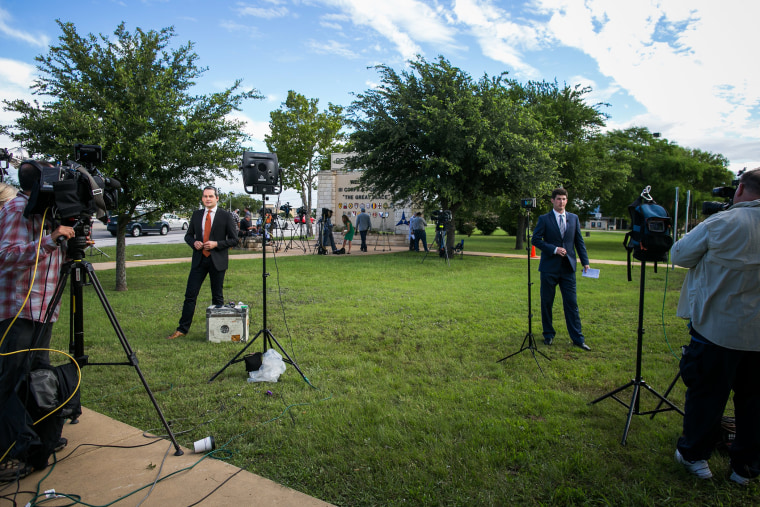 Media outlets gather outside the Bernie Beck gate at Fort Hood on June 3, 2016 in Fort Hood, Texas. (Photo by Drew Anthony Smith/Getty)