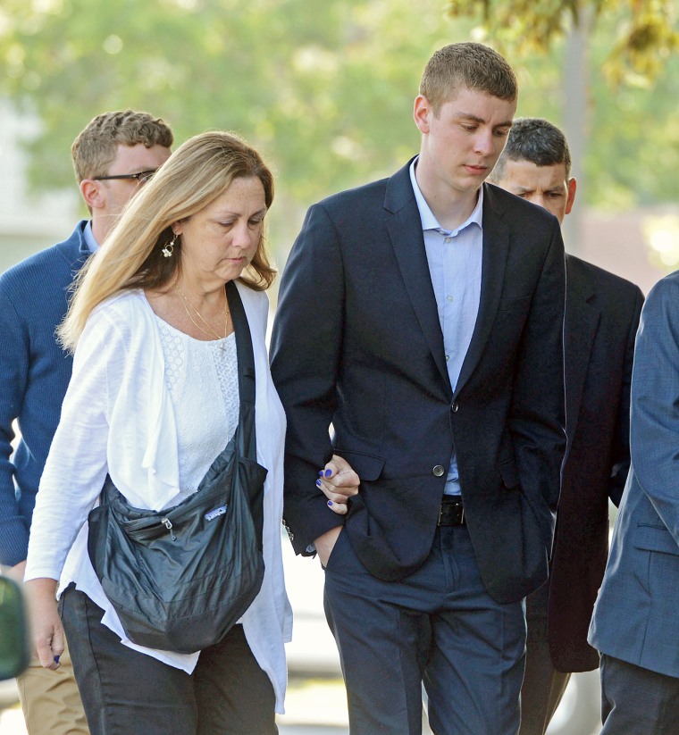 In this June 2, 2016 photo, Brock Turner, 20, right, makes his way into the Santa Clara Superior Courthouse in Palo Alto, Calif. (Photo by Dan Honda/Bay Area News Group/AP)