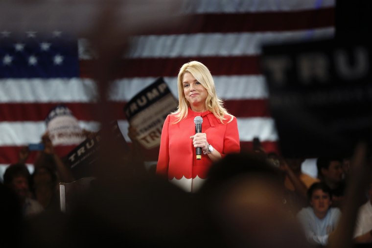 Fla. Attorney General Pam Bondi makes introductory remarks for Republican presidential candidate Donald Trump, before Trump arrives at a campaign event in Tampa, Fla. on March 14, 2016. (Photo by Gerald Herbert/AP)