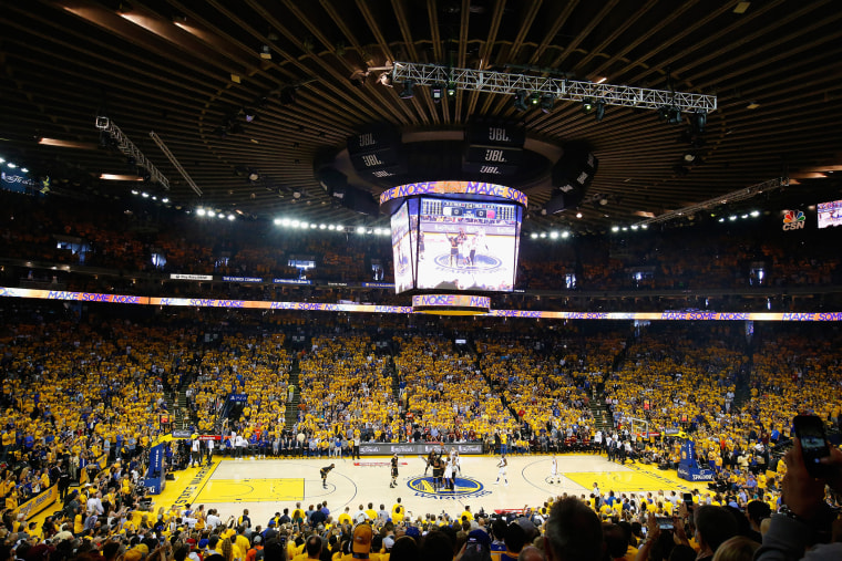 A view of the opening tip-off in Game 7 of the 2016 NBA Finals between the Golden State Warriors and the Cleveland Cavaliers at ORACLE Arena on June 19, 2016 in Oakland, Calif. (Photo by Ronald Martinez/Getty)