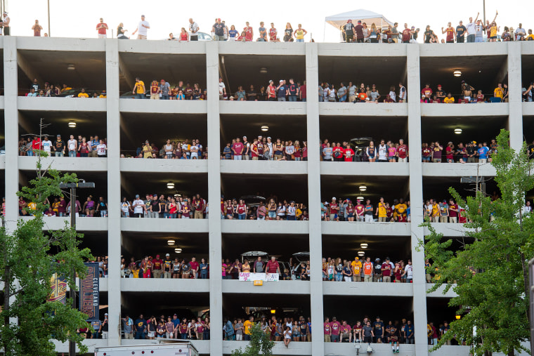 Fans fill a parking garage with in view of Quicken Loans Arena during the Cleveland Cavaliers NBA Finals Game Seven watch party on June 19, 2016 in Cleveland, Ohio. (Photo by Jason Miller/Getty)