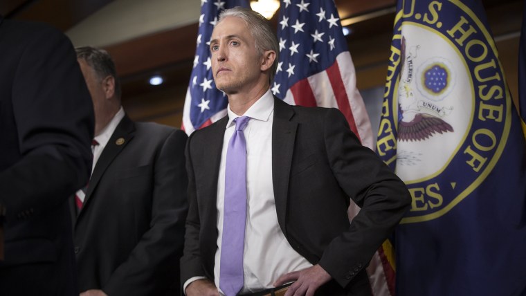House Benghazi Committee Chairman Rep. Trey Gowdy, R-S.C., steps back as other Republican members of the panel discuss the final report on Benghazi, June 28, 2016, on Capitol Hill in Washington. (Photo by J. Scott Applewhite/AP)