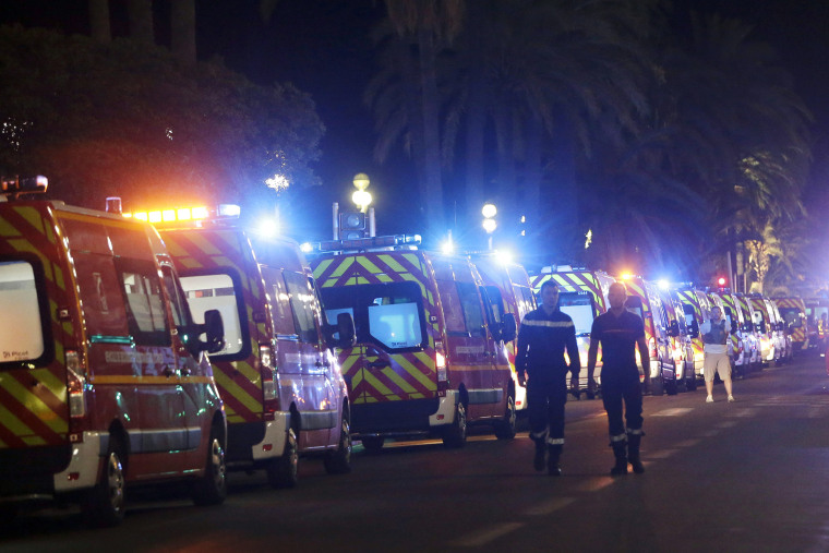 Ambulances line up near the scene of the attack in the French resort city of Nice, southern France, July 15, 2016. (Photo by Claude Paris/AP)