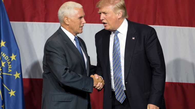US Republican presidential candidate Donald Trump and Indiana Governor Mike Pence taking the stage during a campaign rally at Grant Park Event Center in Westfield, Indiana July 12, 2016. (Photo by Tasos Katopodis/AFP/Getty)