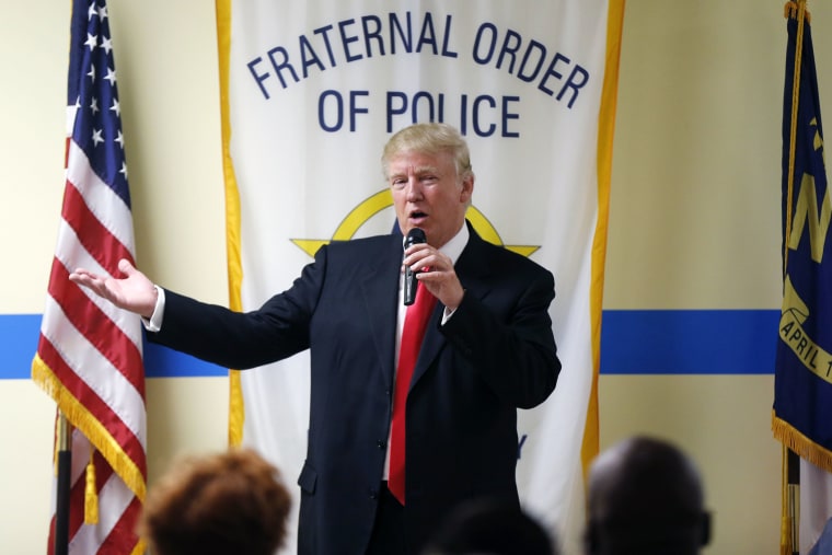 Republican presidential candidate Donald Trump speaks to retired and active law enforcement personnel at a Fraternal Order of Police lodge during a campaign stop in Statesville, N.C. on Aug. 18, 2016. (Photo by Gerald Herbert/AP)