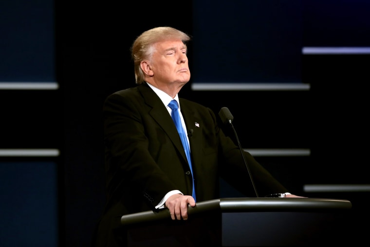 Republican presidential nominee Donald Trump looks on during the Presidential Debate at Hofstra University on Sept. 26, 2016 in Hempstead, N.Y. (Photo by Drew Angerer/Getty)
