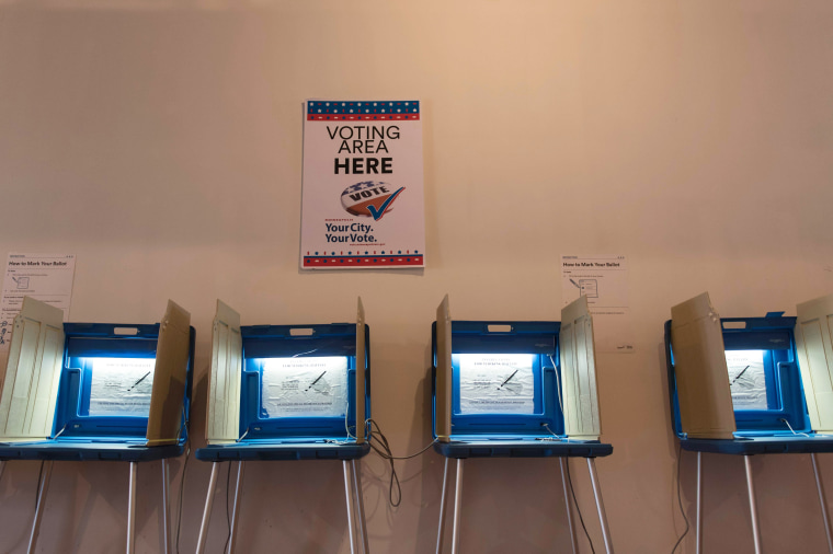Voting booths inside the Early Vote Center, Oct. 5, 2016, in Minneapolis, Minn. (Photo by Stephen Maturen/AFP/Getty)