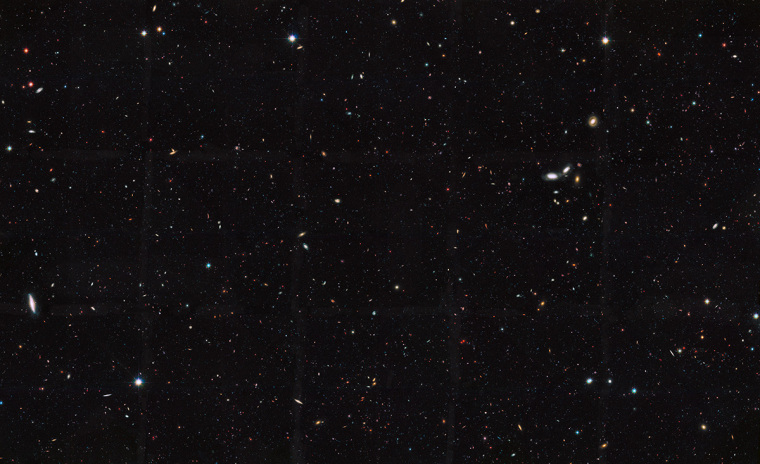 This Hubble Space Telescope view reveals thousands of galaxies stretching back into time across billions of light-years of space.