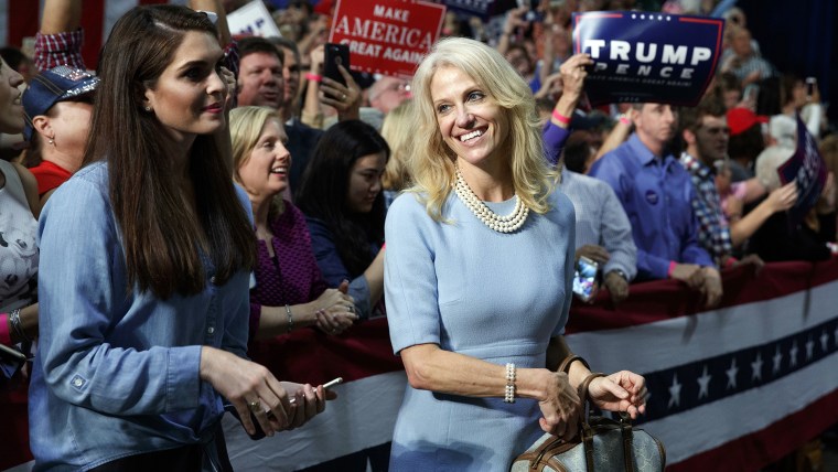 Kellyanne Conway, campaign manager for Republican presidential candidate Donald Trump, right, and press secretary Hope Hicks watch during a campaign rally on Oct. 14, 2016, in Charlotte, N.C. (Photo by Evan Vucci/AP)