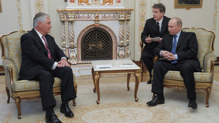 Russian Prime Minister Vladimir Putin, right, listens to Rex W. Tillerson, chairman and chief executive officer of Exxon Mobil Corporation at their meeting outside Moscow, April 16, 2012. (Alexei Nikolsky/Government Press Service/RIA-Novosti/AP)