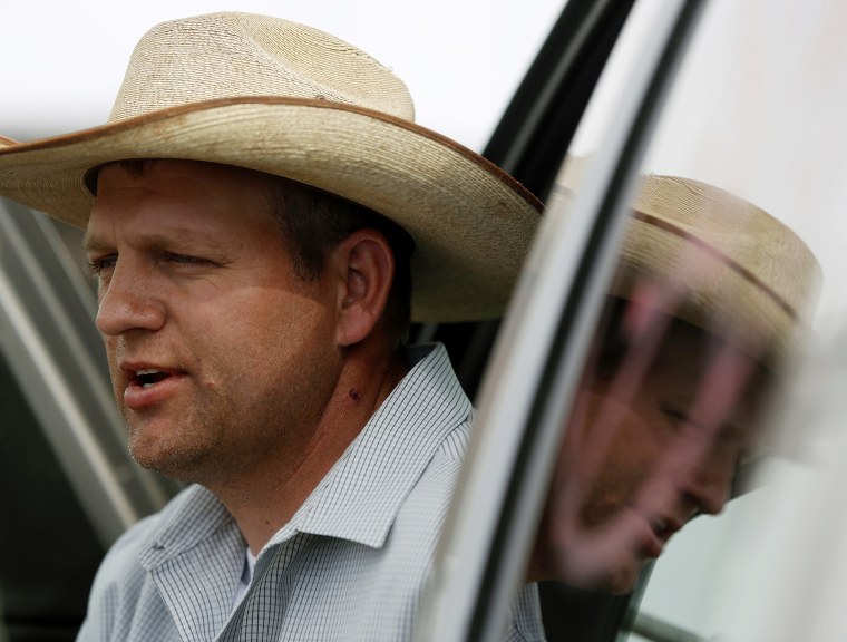 Ammon Bundy, son of rancher Cliven Bundy, talks about being tasered in Bunkerville, Nev., April 11, 2014. (Photo by Jim Urquhart/Reuters)