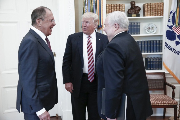 This file handout photo taken on May 10, 2017 made available by the Russian Foreign Ministry shows shows US President Donald J. Trump (C) speaking with Russian Foreign Minister Sergei Lavrov (L) and Russian Ambassador to the US, Sergei Kislyak.