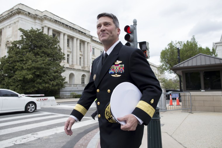 Image: Ronny Jackson walks on Capitol Hill following a meeting