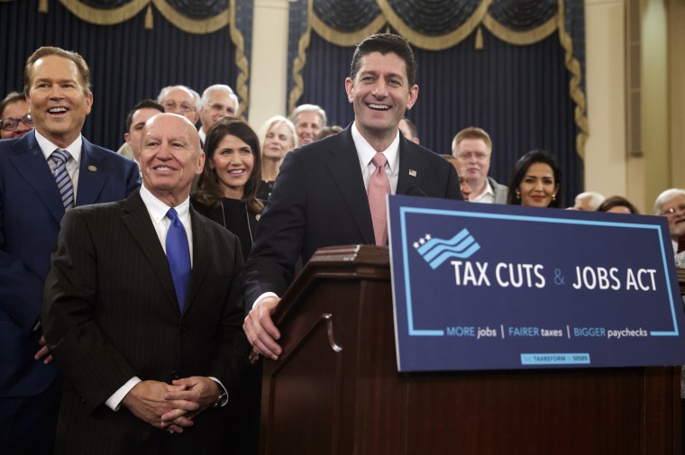 Speaker of the House Paul Ryan, R-Wis., joined by, from left, Rep. Vern Buchanan, R-Fla., House Ways and Means Committee Chairman Kevin Brady, R-Texas, and Rep. Kristi Noem, R-S.D., smiles as they unveil the GOP's tax overhaul, Nov. 2, 2017.