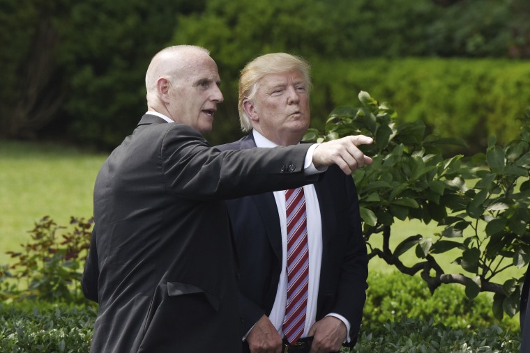 Keith Schiller, deputy assistant to the president and director of Oval Office operations talks to President Donald Trump during a ceremony to welcome the 2016 NCAA Football National Champions The Clemson Tigers on the South Lawn of the White House on June