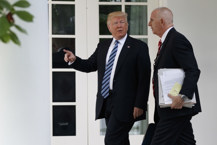 In a Tuesday, May 2, 2017 file photo, President Donald Trump walks with aide Keith Schiller to the Oval Office of the White House in Washington.