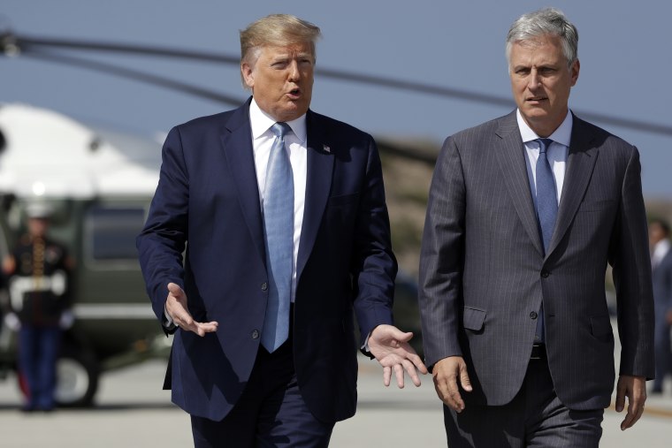 President Donald Trump and Robert O'Brien, just named as the new national security adviser, walk to speak to the media at Los Angeles International Airport, Wednesday, Sept. 18, 2019, in Los Angeles.