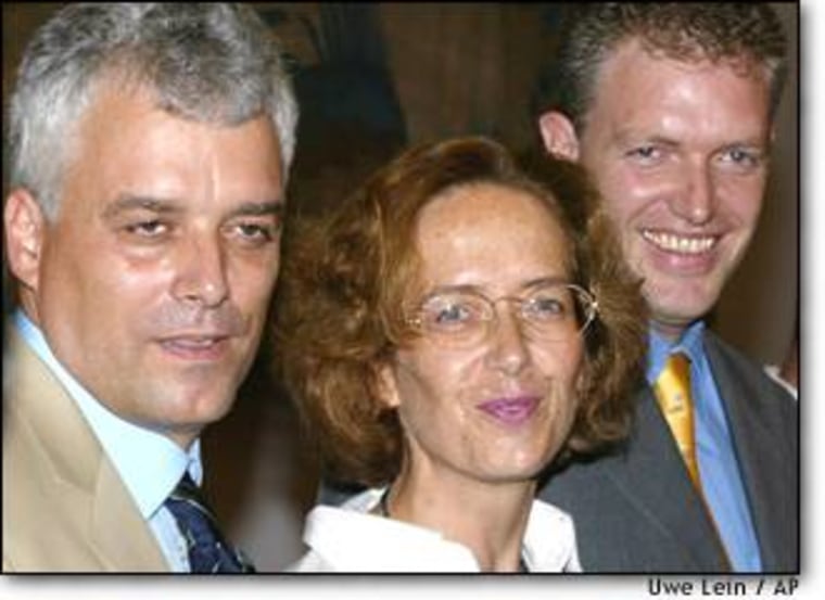 Dyrk Hesshaimer, Astrid Bouteuil and David Hesshaimer, from left to right, appear at an August news conference in Munich to discuss their claim to be illegitimate children of aviator Charles Lindbergh.