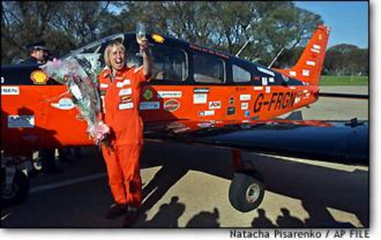 British aviator Polly Vacher, shown in an October photo taken in Buenos Aires, has reached Antarctica nearly halfway through her round-the-world flight, organizers say.