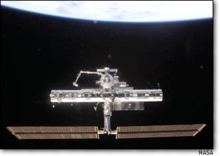 The international space station sails 250 miles above Earth, as seen in a photo taken from the shuttle Endeavour in December 2002.