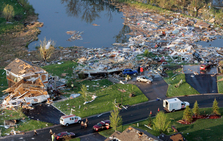 Houses lay demolished in Hugo, Minn. on May 25 after a twister plowed through.