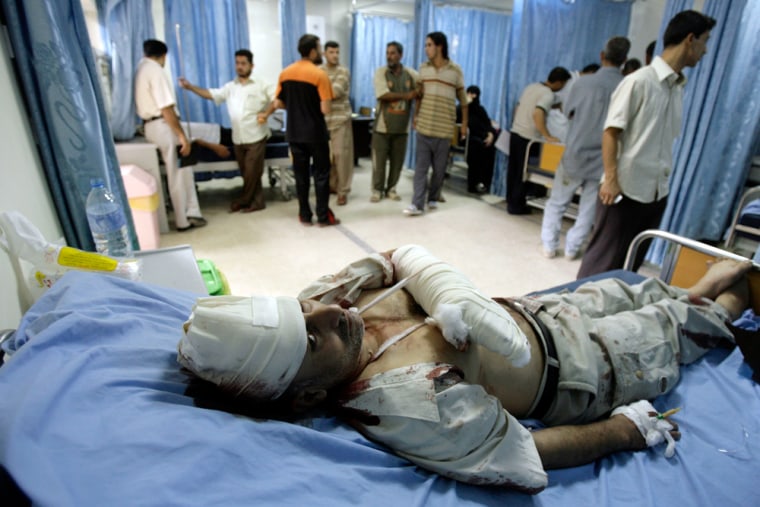 A person injured in the truck bomb blast lies in a hospital in Baghdad on Sunday.