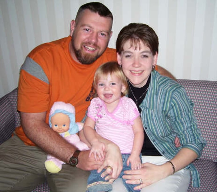 This December 2007 photo provided by the Dwyer family shows Joseph Dwyer, left, with his wife Matina and daughter Meagan while in treatment at Northport Veterans Affairs Medical Center in Northport, N.Y.   (AP Photo/Dwyer Family Photo) ** NO SALES, FAMILY PHOTO - BEST QUALITY AVAILABLE **