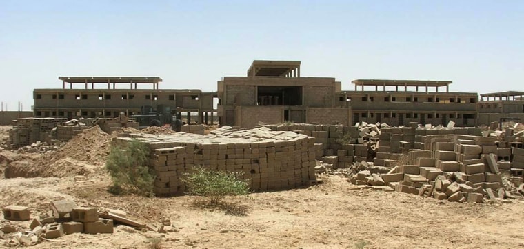 The Khan Bani Saad Correctional Facility, about 12 miles northeast of Baghdad, sits among  unused building materials. The site is considered a chronicle of U.S. government waste, misguided planning and construction shortcuts costing $40 million and stretching back to the American overseers who replaced Saddam Hussein.