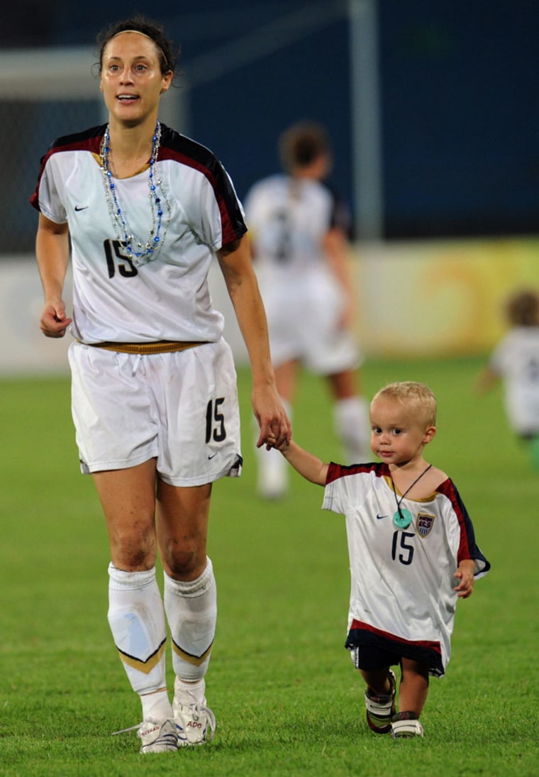 Kate Markgraf walks with her son Keegan