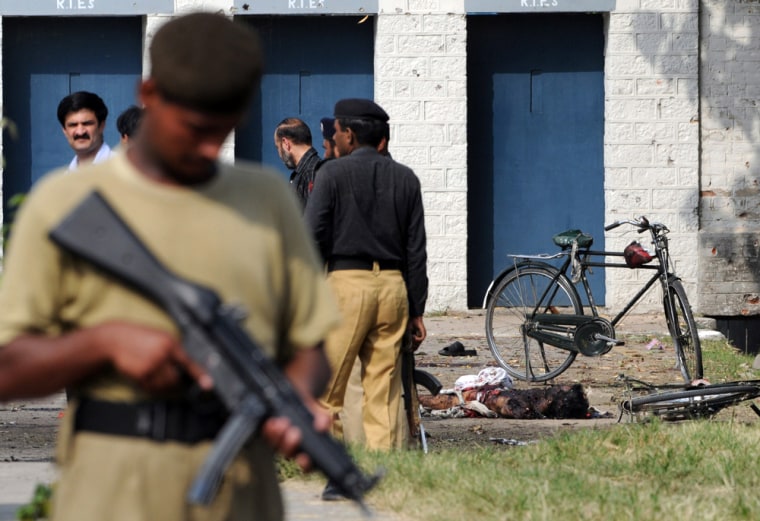 Image: Pakistani security at the site of the attack