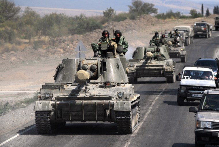 Image: A column of Russian tanks leaves Gori