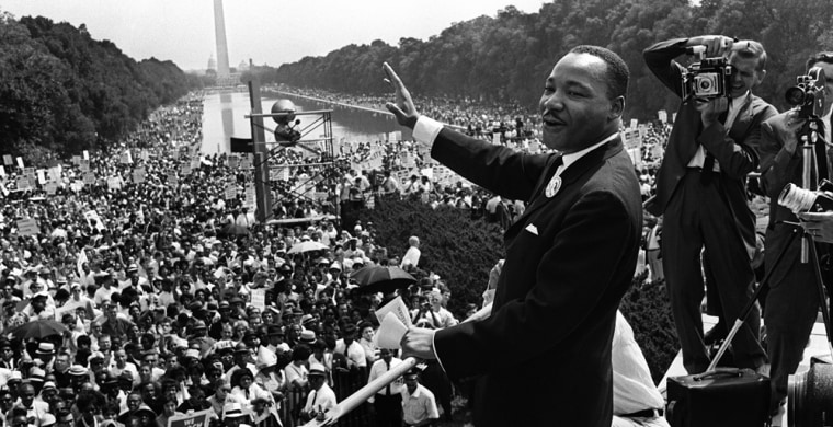 Image: The civil rights leader Martin Luther King waves to supporters 28 August 1963 on the Mall in Washington DC.