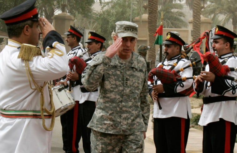 Image: U.S. military commander in Iraq General David Petraeus salutes an Iraqi military band during a farewell ceremony for him in Baghdad